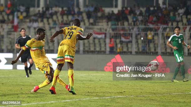 Hdji Drame of Mali scores his teams opening goal during the FIFA U-17 World Cup India 2017 Round of 16 match between Mali and Iraq at Pandit...