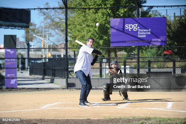 Former New York Yankees MLB baseball player, Paul O'Neill leads the SPG Moments homerun hitting event with a team of kids at Macombs Dam Park on...