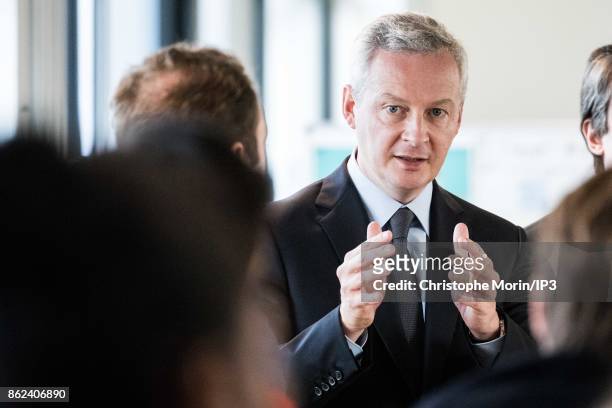 French Economy Minister Bruno Le Maire inaugurates the Digital Factory by Thales with Thales CEO Patrice Caine on October 17, 2017 in Paris, France....