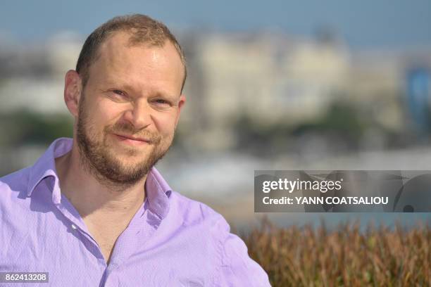 English actor Robert Webb poses during the MIPCOM trade show in Cannes, southern France, on October 17, 2017.