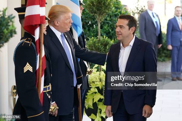 President Donald Trump welcomes Greek Prime Minister Alexis Tsipras to the White House October 17, 2017 in Washington, DC. A left-wing socialist,...