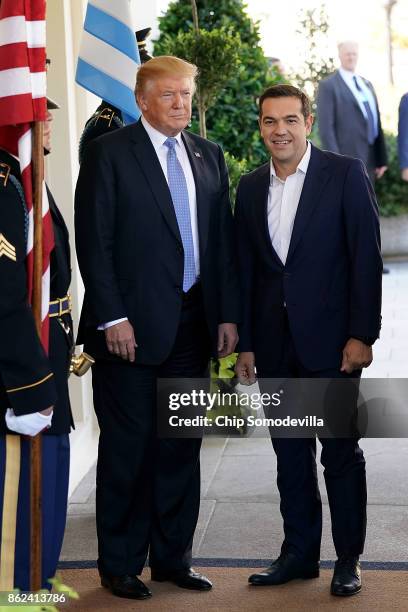 President Donald Trump welcomes Greek Prime Minister Alexis Tsipras to the White House October 17, 2017 in Washington, DC. A left-wing socialist,...