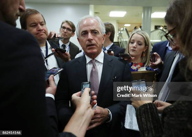 Sen. Bob Corker speaks to reporters in the Senate subway underneath the US Capitol, on October 17, 2017 in Washington, DC.