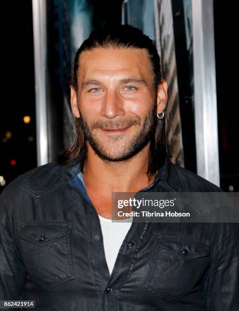 Zach McGowan attends the premiere of Warner Bros. Pictures 'Geostorm' at TCL Chinese Theatre on October 16, 2017 in Hollywood, California.