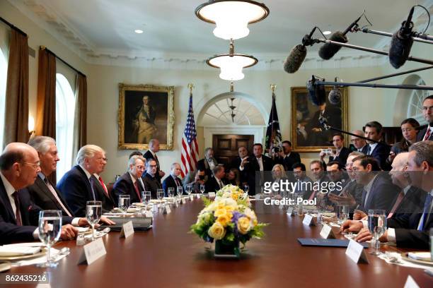 President Donald J. Trump hosts Greek Prime Minister Alexis Tsipras for a working lunch in the Cabinet Room on October 17, 2017 at the White House in...