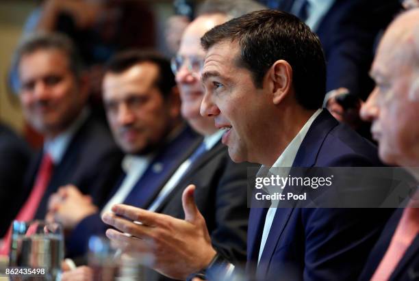 Greek Prime Minister Alexis Tsipras speaks during a working lunch with U.S. President Donald J. Trump and senior cabinet members in the Cabinet Room...
