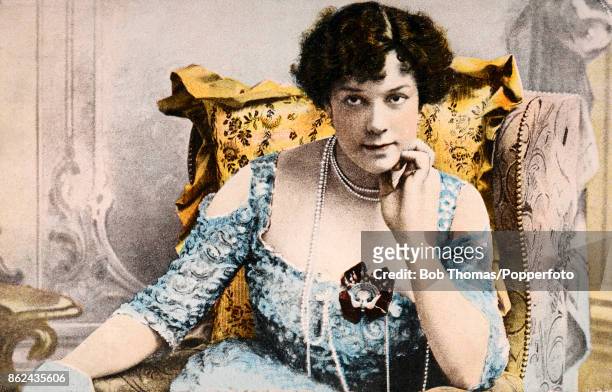Vintage postcard illustration featuring the English contralto Clara Butt wearing her Dame of the Britiish Empire medal, circa 1920.