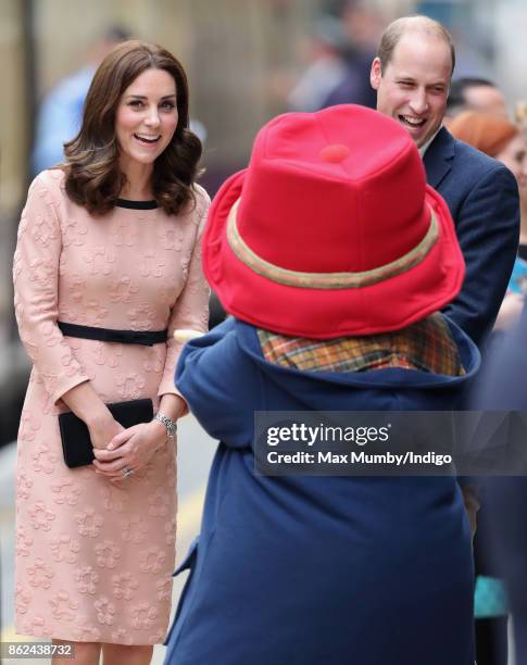 Catherine, Duchess of Cambridge, Paddington Bear and Prince William, Duke of Cambridge attend the Charities Forum Event at Paddington Station on...