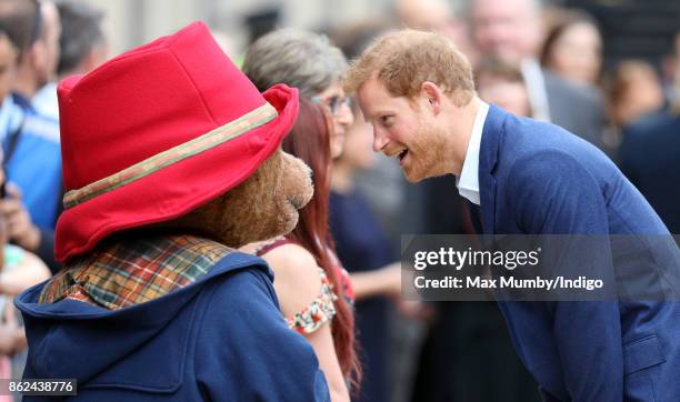 Paddington Bear greets Prince Harry as he attends the Charities Forum Event at Paddington Station on October 16, 2017 in London, England.