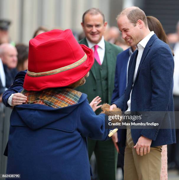 Paddington Bear greets Prince William, Duke of Cambridge as he attends the Charities Forum Event at Paddington Station on October 16, 2017 in London,...