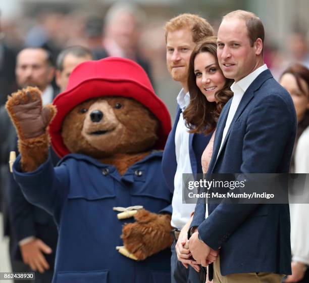 Paddington Bear, Prince Harry, Catherine, Duchess of Cambridge and Prince William, Duke of Cambridge attend the Charities Forum Event at Paddington...