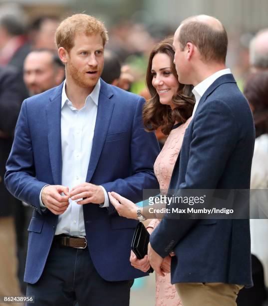 Prince Harry, Catherine, Duchess of Cambridge and Prince William, Duke of Cambridge attend the Charities Forum Event at Paddington Station on October...