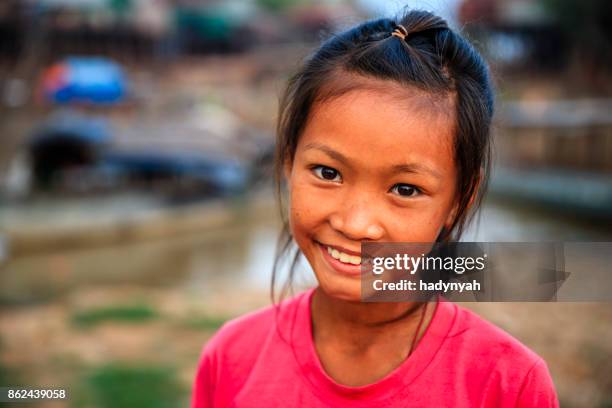 portrait of happy cambodian little girl, cambodia - cambodian ethnicity stock pictures, royalty-free photos & images