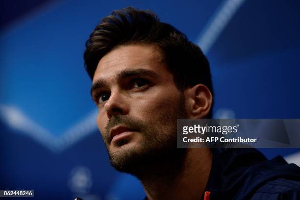 Olympiacos' Spanish defender Alberto Botia attends a press conference at the Camp Nou staduium in Barcelona on October 17, 2017 on the eve of the...