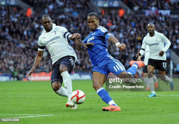 Ledley King of Tottenham Hotspur and Didier Drogba of Chelsea in action during the FA Cup Semi Final at Wembley Stadium on April 15, 2012 in London,...