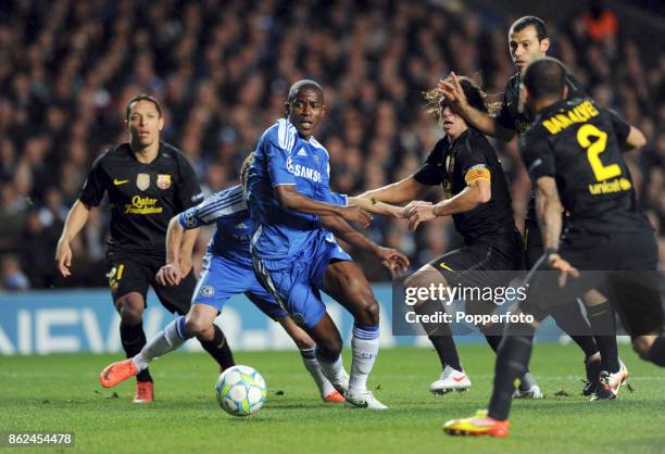 Carles Puyol of Barcelona and Ramires of Chelsea in action during the UEFA Champions League Semi Final 1st Leg at Stamford Bridge on April 18, 2012...