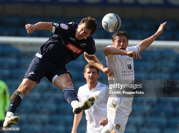 Darius Henderson of Millwall and Michael Brown of Leeds United in action during a Npower Championship match at The New Den on March 24, 2012 in...