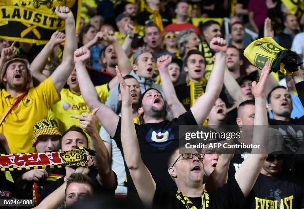 Borussia Dortmund supporters chant slogans ahead of the UEFA Champions League football match between Apoel FC and Borussia Dortmund at the GSP...