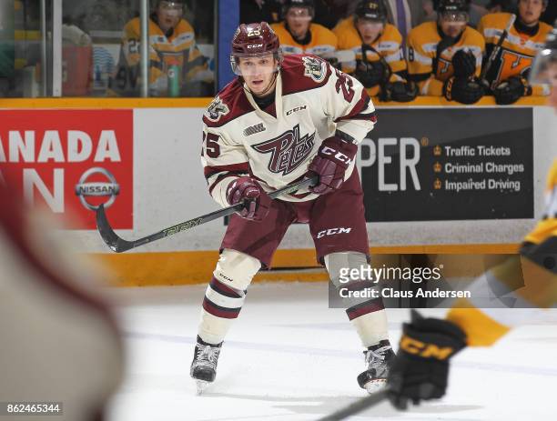 Nikita Korostelev of the Peterborough Petes skates against the Kingston Frontenacs in an OHL game at the Peterborough Memorial Centre on October 12,...