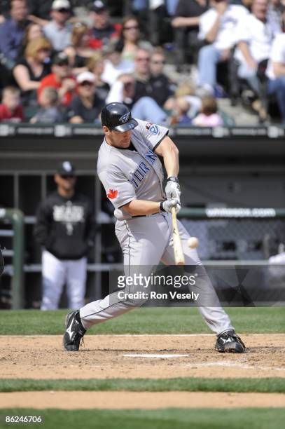 Scott Rolen of the Toronto Blue Jays connects for single in the eighth inning to drive in the winning run against the Chicago White Sox at U.S....