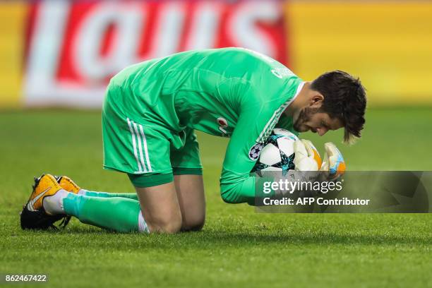 Besiktas' Spanish goalkeeper Fabricio Agosto Ramirez stops the ball during the UEFA Champions League group stage football match between Monaco and...