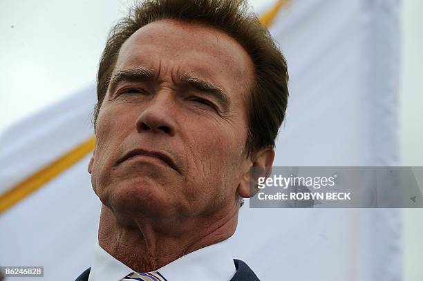 California Governor Arnold Schwarzenegger speaks at a press conference on the swine flu situation on April 27, 2009 in Beverly Hills,CA. US officials...