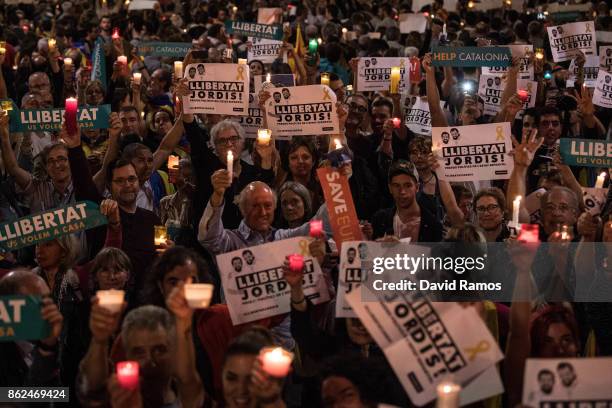 Citizens gather to protest against imprisonment of two key members of the Catalan independence movement on October 17, 2017 in Barcelona, Spain. A...