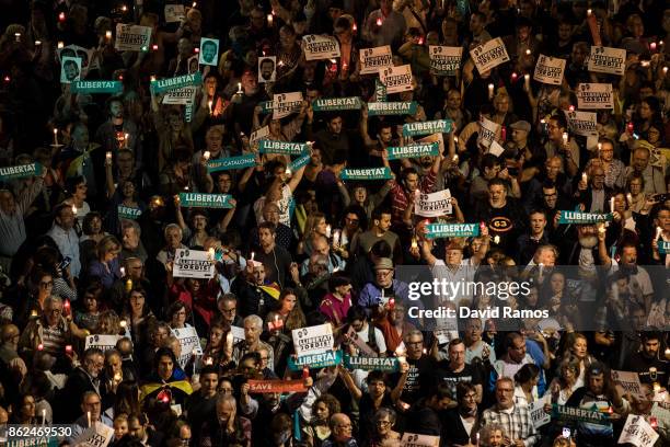 Citizens gather to protest against imprisonment of two key members of the Catalan independence movement on October 17, 2017 in Barcelona, Spain. A...