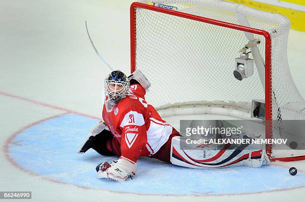 Denmark's goalkeeper Sebastian Dahm deflects a puck during the preliminary round group D game of the IIHF Internetional Ice Hockey World Championship...
