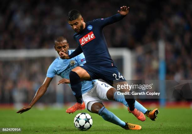 Fernandinho of Manchester City and Lorenzo Insigne of SSC Napoli battle for possession during the UEFA Champions League group F match between...