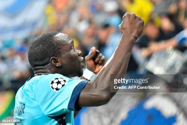 Porto´s Cameroonian forward Vincent Aboubakar celebrates scoring during the UEFA Champions League group G football match RB Leipzig v FC Porto in...