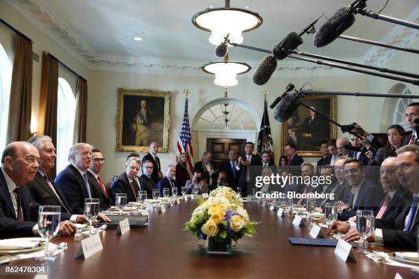President Donald Trump, third left, meets with Alexis Tsipras, Greece's prime minister, third right, during a working lunch in the Cabinet Room of...