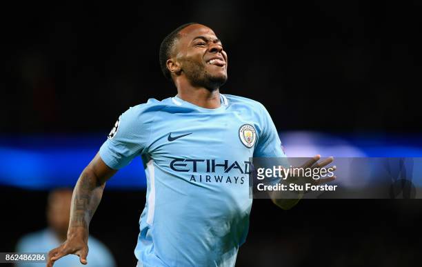 Raheem Sterling celebrates after scoring the opening goal for Manchester City during the UEFA Champions League group F match between Manchester City...