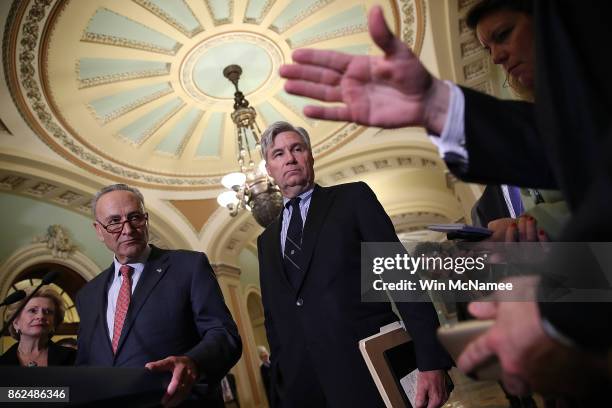 Senate Minority Leader Chuck Schumer and Sen. Sheldon Whitehouse answer questions during a news conference following the weekly Democratic policy...