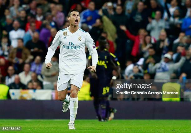 Cristiano Ronaldo of Real Madrid celebrates scoring his sides first goal during the UEFA Champions League group H match between Real Madrid and...
