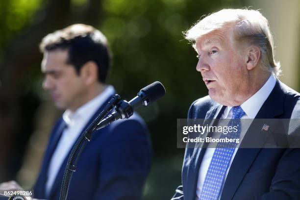 President Donald Trump speaks as Alexis Tsipras, Greece's prime minister, listens during a joint press conference in the Rose Garden of the White...