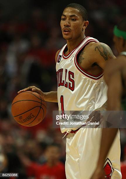 Derrick Rose of the Chicago Bulls brings the ball upcourt against the Boston Celtics in Game Three of the Eastern Conference Quarterfinals during the...