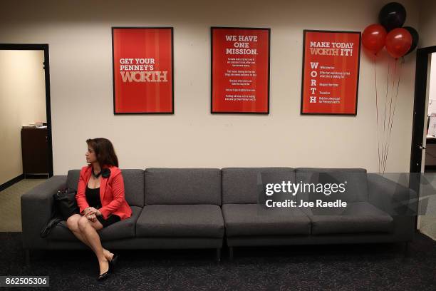 Janice Montalvo waits to be interviewed for a seaonal job during a job fair at the J.C. Penny department store in the Dadeland Mall on October 17,...