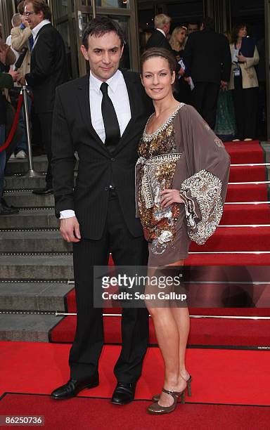 Actress Lisa Martinek and friend Giulio Ricciarelli attend the 25th anniversary of Friedrichstadtpalast on April 27, 2009 in Berlin, Germany.