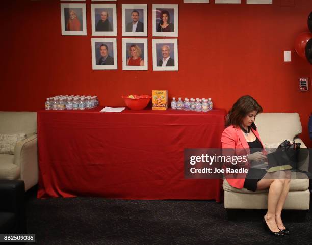 Janice Montalvo waits to be interviewed for a seaonal job during a job fair at the J.C. Penny department store in the Dadeland Mall on October 17,...