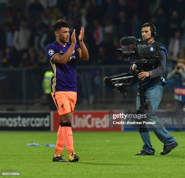 Alex Oxlade-Chamberlain of Liverpool shows his appreciation to the fans at the end of the UEFA Champions League group E match between NK Maribor and...