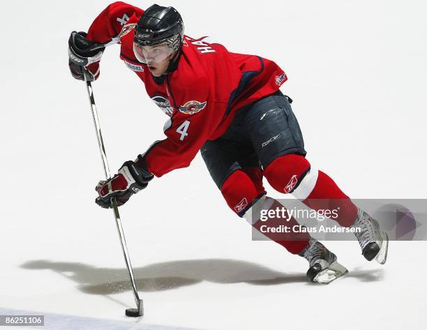 Taylor Hall of the Windsor Spitfires skates up ice with the puck in game 5 of the Western Conference Championship against the London Knights on April...