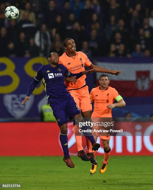 Joel Matip of Liverpool goes up with Marcos Tavares of NK Mariborduring the UEFA Champions League group E match between NK Maribor and Liverpool FC...