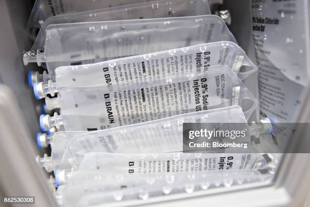 Bags of saline, manufactured by B. Braun Medical Inc., sit in a bin at the pharmacy inside Perry Memorial Hospital in Princeton, Illinois, U.S., on...