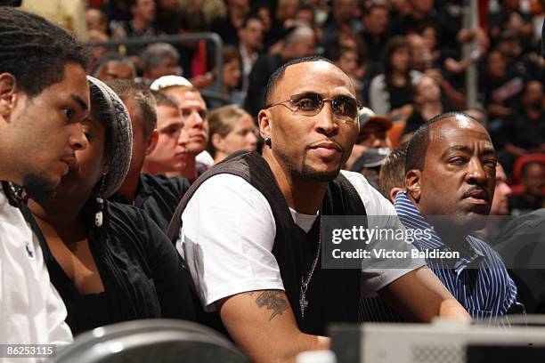 Shawn Marion of the Toronto Raptors watches the Miami Heat play the Atlanta Hawks in Game Four of the Eastern Conference Quarterfinals during the...