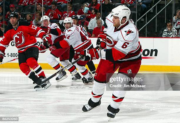 Tim Gleason of the Carolina Hurricanes skates against the New Jersey Devils during Game Five of the Eastern Conference Quarterfinal Round of the 2009...