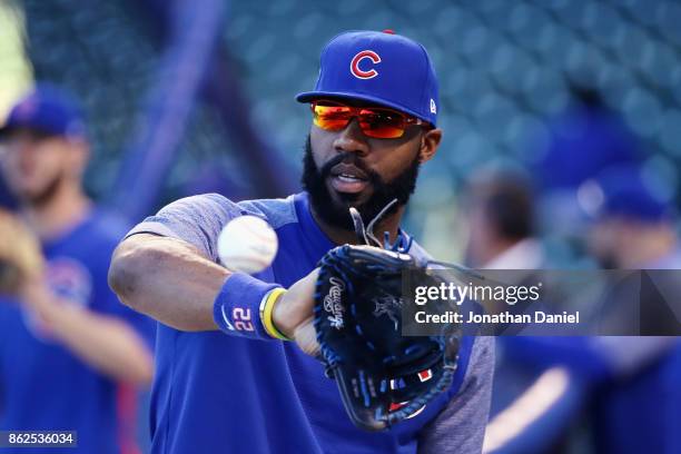 Jason Heyward of the Chicago Cubs warms up before game three of the National League Championship Series against the Los Angeles Dodgers at Wrigley...