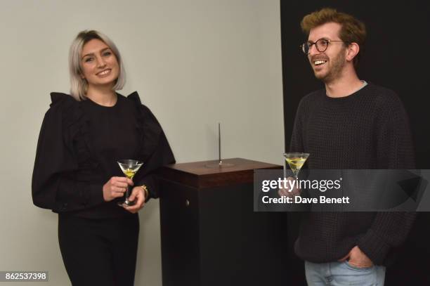 Victoria Williams and Hayden Kays attend a private view of "Jason Shulman: Some Work" presented by The Ivy Club and The Cob Gallery at The Cob...