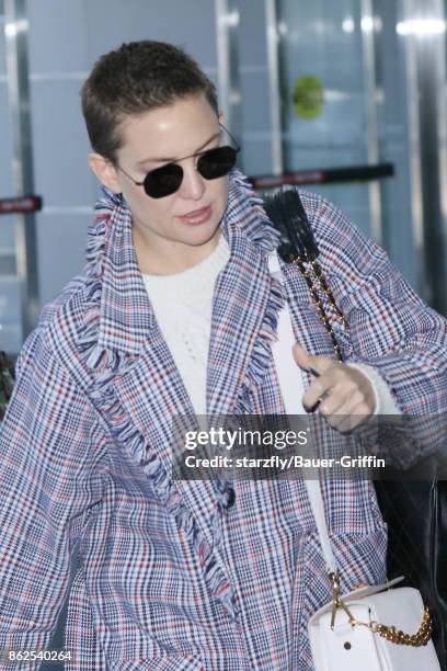 Kate Hudson is seen at JFK on October 17, 2017 in New York City.