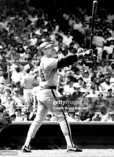 Reggie Jackson of the California Angels adjusts his shirt during an MLB game against the New York Yankees circa 1982 at Yankee Stadium in the Bronx,...
